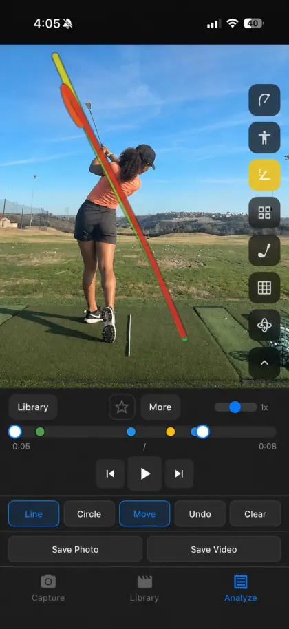 SwingDraw swing path trace over a golfer in a down-the-line range video