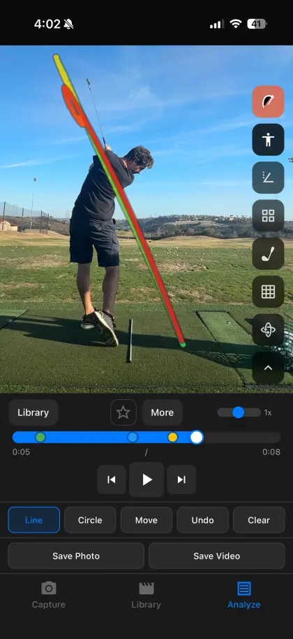 SwingDraw swing path trace over a golfer at the top of the backswing